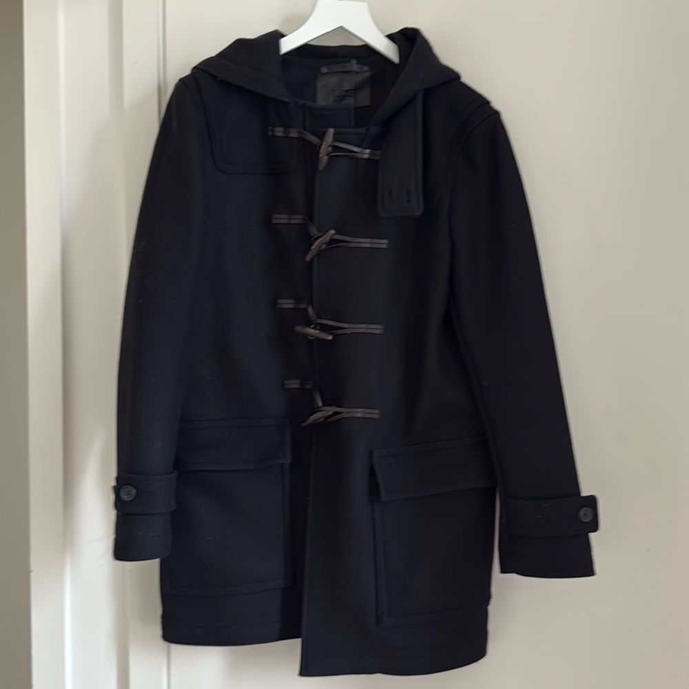 Barely worn Coach 100% wool jacket in black. Size M